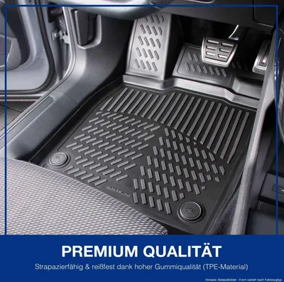 Interior of a car showing custom-fit floor mats.