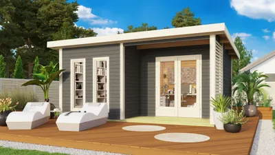 A modern garden house with a wooden deck and lounge chairs, set in a garden.
