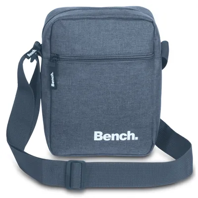 A studio shot of a grey Bench crossbody bag.