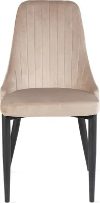A front view of a beige velvet dining chair with black legs.