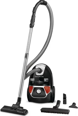 A Rowenta Compact Power RO3955EA cylinder vacuum cleaner with accessories, displayed against a white background.