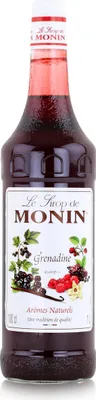 A bottle of Monin Grenadine syrup against a white background.