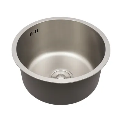 A round stainless steel sink with a dark gray exterior.
