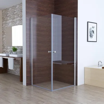 A modern bathroom with a glass shower enclosure.