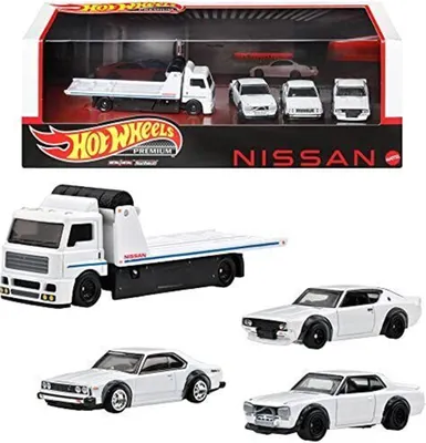A Hot Wheels Premium Nissan Collector Set with a tow truck and several Nissan Skyline models displayed in packaging.