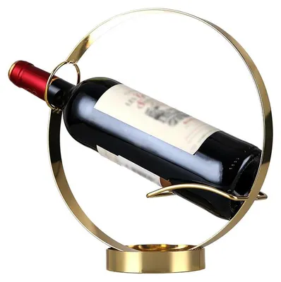 Produktbild von Goldfarbenes Weinregal für eine Flasche – freistehend, ideal für Küche und Esstisch, auch als Tischdekoration und Wohnaccessoire geeignet.