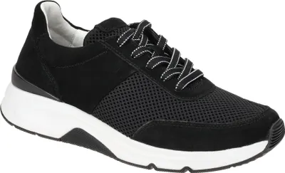 A studio shot of a single black sneaker.