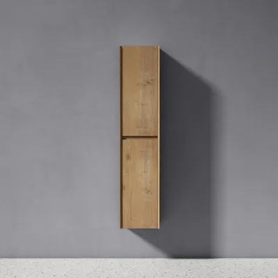 A wooden cabinet is mounted on a gray wall, with a shadow cast to the right.