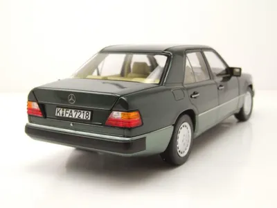 Produktbild von Norev 183952 Mercedes 230 E W124 1990 dunkelgrün metallic 1:18