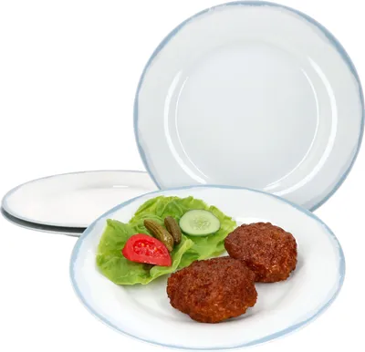 A set of plates with food on one of them.