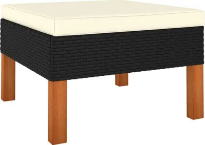 A square ottoman with a cream cushion and a black woven base, supported by four brown wooden legs, is shown against a white background.