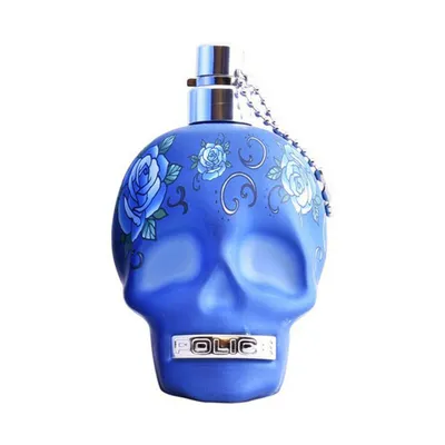 A blue skull-shaped perfume bottle with floral designs.