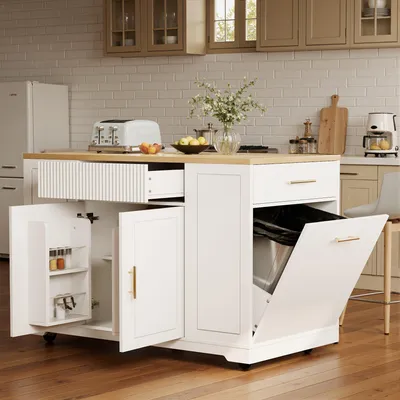 A white kitchen island with a wooden countertop is shown in a kitchen setting.