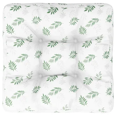 A square cushion with a green leaf pattern on a white background.