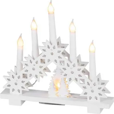 A white Christmas candle bridge with LED lights and snowflake cutouts.