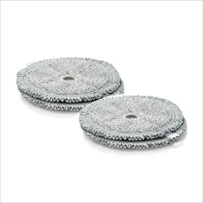 Two round, gray cleaning pads are stacked on a white background.