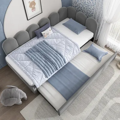 A children's bedroom with a pull-out sofa bed.