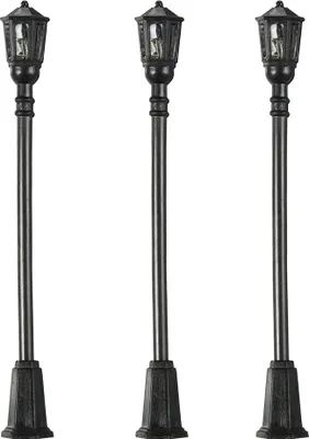 Three black street lamps are arranged in a row against a white background.