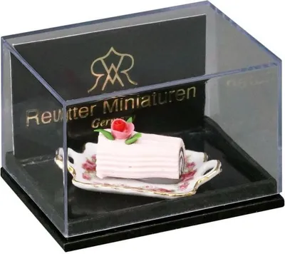 Produktbild von Rosa Schokorolle Miniatur für Puppenstuben aus Porzellan