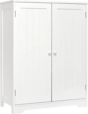 A white cabinet with two doors and two knobs.