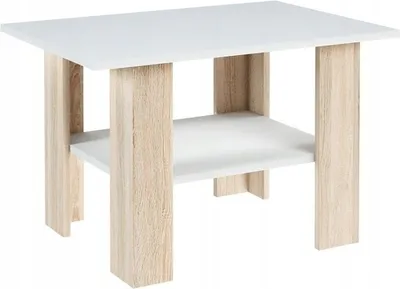 A modern couch table with a white top and wooden legs and shelf.
