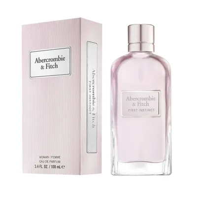 A perfume bottle and its box are displayed against a white background.