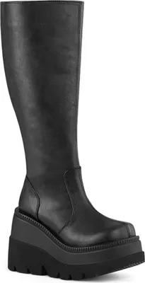 A studio shot of a single black boot.