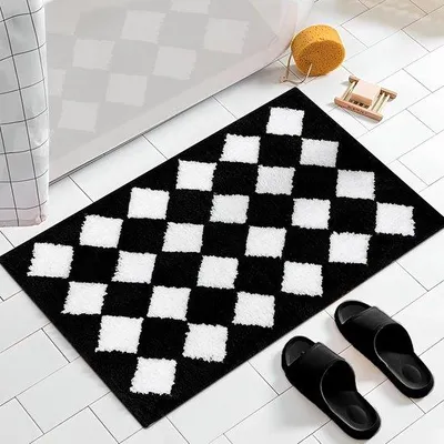 Zdjęcie produktu dla Mata podłogowa Unyqoos® czarna, 50 x 80 cm – wykonana z chłonnej mikrofibry, z antypoślizgową podkładką TPR, można prać w pralce, idealna do łazienki, kuchni i przedpokoju