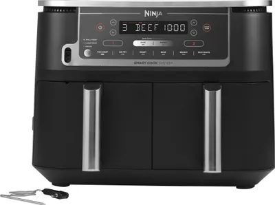 A black Ninja Foodi Max Dual Zone air fryer with a digital display and control panel.