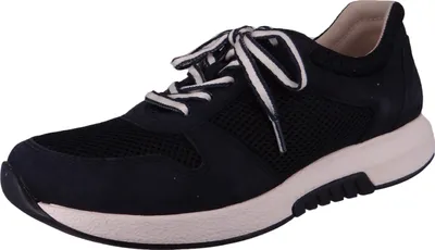 A single navy blue sneaker with white laces and a beige sole is shown against a white background.