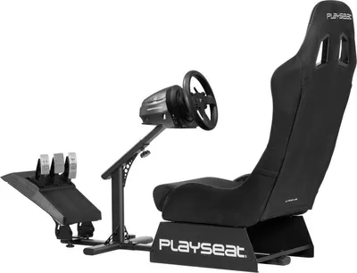 A black racing simulator seat with a steering wheel and pedals, shown against a white background.
