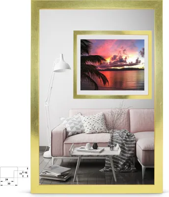 A living room scene with a pink sofa, a coffee table, and a framed picture on the wall.