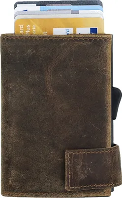 A close-up view of a brown leather cardholder with cards inserted.