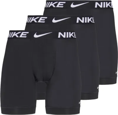 Three pairs of black Nike boxer briefs are shown from the front, arranged in a staggered formation.