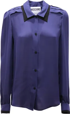 Imagen del producto de 3494AQ: Camisa de mujer MOSCHINO COUTURE, confeccionada en seda, color azul