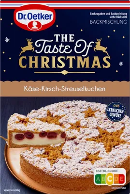 A box of Dr. Oetker's "The Taste of Christmas" cake mix, featuring an image of the finished cake.