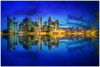 Produktbild von Wallario Premium Glasbild, freischwebende Optik, kräftige Farben, Größe 90 x 60 cm Motiv Skyline von Singapur in der Abenddämmerung