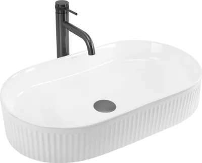 A white oval countertop sink with a black faucet against a white background.