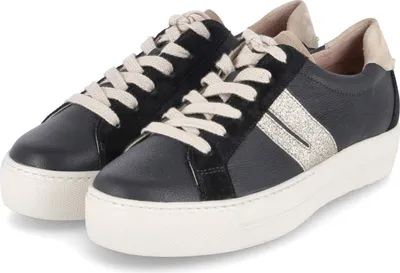 A pair of black leather low-top sneakers with white laces and soles, featuring gold accents and suede detailing.