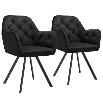 Two black velvet armchairs with tufted seats and black metal legs, shown against a white background.