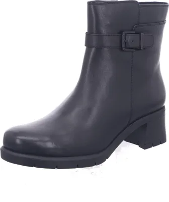 A studio shot of a single black boot against a white background.