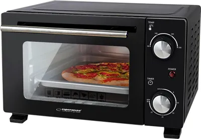 A black mini oven with a pizza inside.