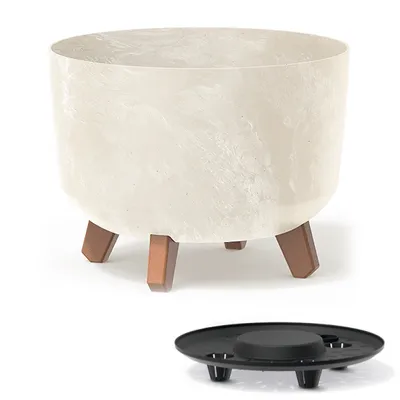 A planter pot with three legs and a separate drainage tray.
