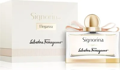 A perfume bottle and its box are displayed on a white background.
