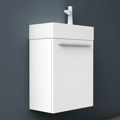 A white bathroom vanity with a sink and faucet mounted on a dark gray wall.