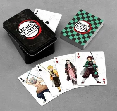 A set of Demon Slayer playing cards in a tin and a deck, with four cards displayed.
