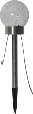 A solar garden light with a cracked glass globe on a white background.
