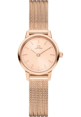 A close-up studio shot of a rose gold watch.