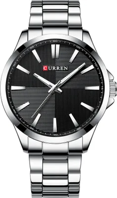 A close-up studio shot of a men's wristwatch.