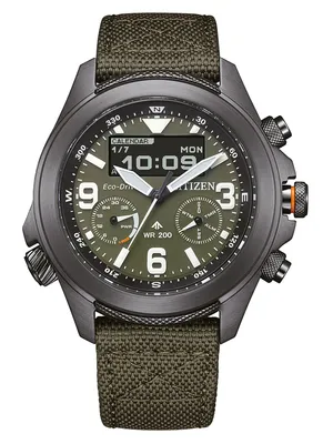 A close-up, front-facing studio shot of a Citizen Promaster watch with a green dial and strap.